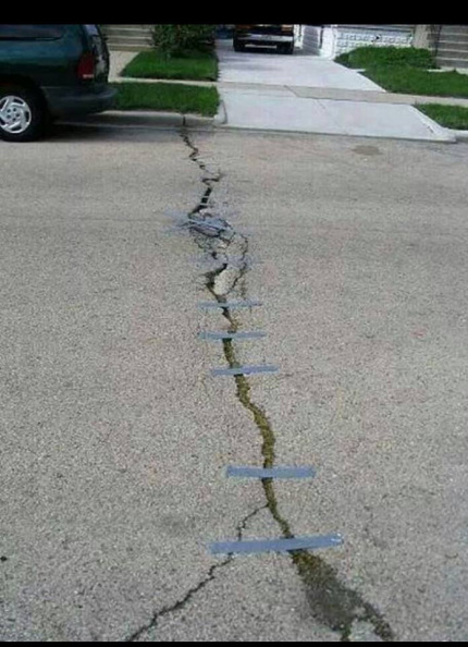 taping_cracks_in_the_road.jpg